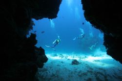 beautifull light in a cave cozumel by Eric Poulin 